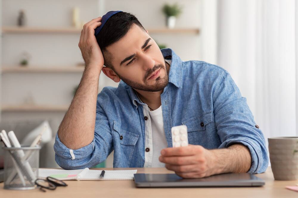 man struggling with adhd medication, prescription drug abuse with methylphenidate, methylphenidate addiction