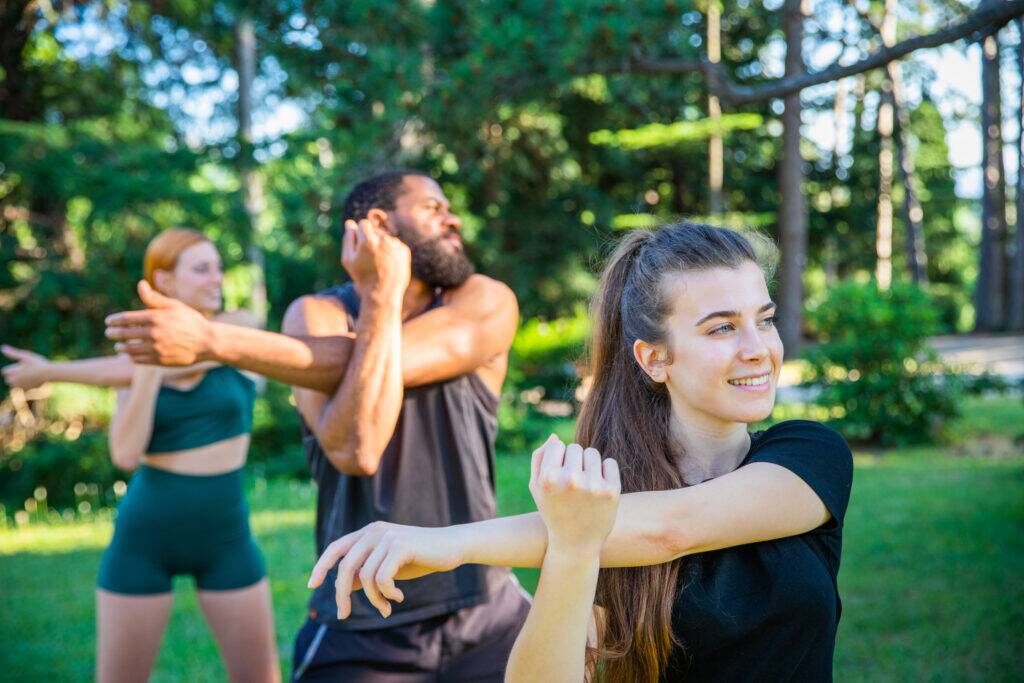 people stretching to relieve neck and shoulder pain