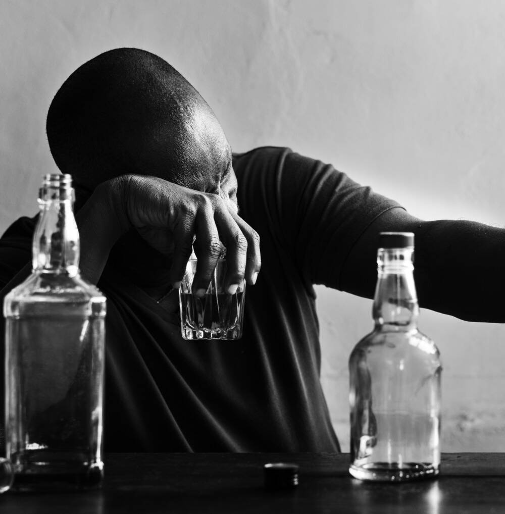 man struggling with alcohol abuse, wet brain syndrome from alcoholism, alcohol detox and rehab treatment