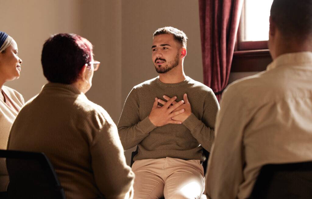 man attending support group to build confidence and courage