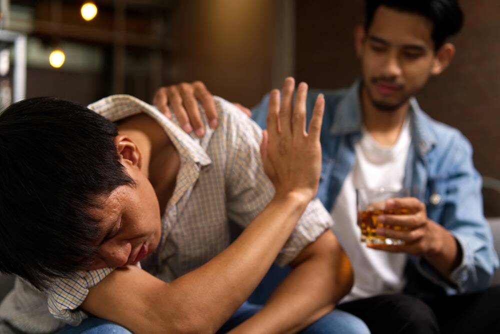 man with alcohol poisoning from borg drinking, short and long term effects of alcohol abuse in young adults